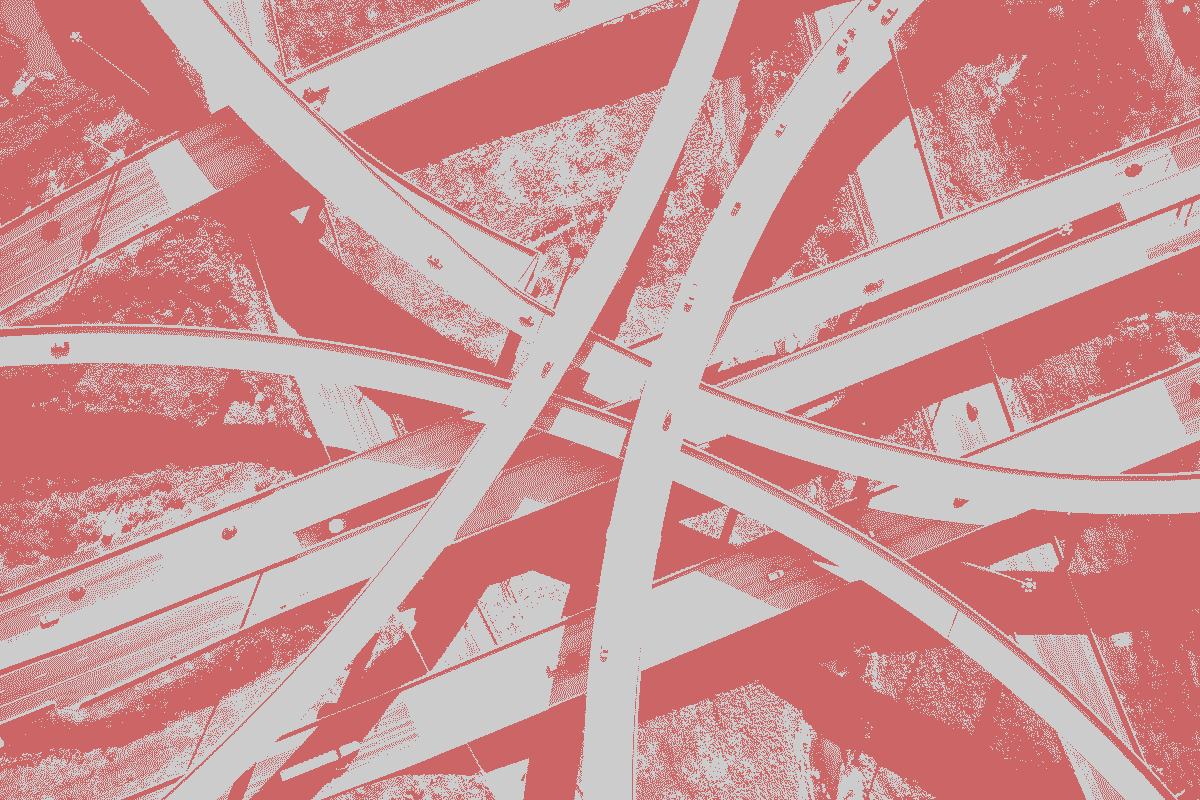 red and white dithered overhead view of freeway intersection